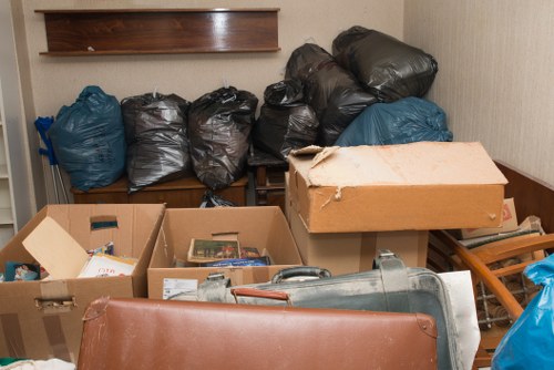 Happy homeowner enjoying cleared loft space